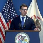 Secretary of State dismisses calls for clarity on migrant’s license status