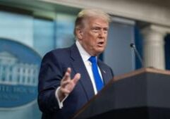 Embattled Fed governor sues Trump over 'illegal' firing