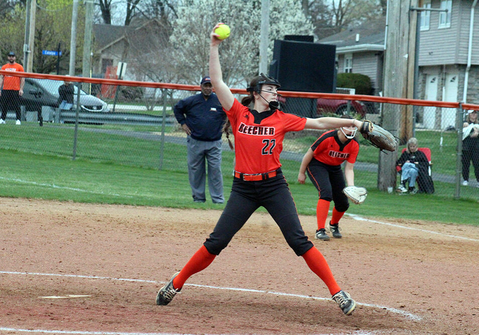 Beecher senior ace Taylor Norkus delivers a pitch during her complete-game outing against Munster. Norkus was completely dominant in the circle, tossing a two-hit shutout and striking out 10 batters without issuing a single walk. —photo by Jim Piacentini